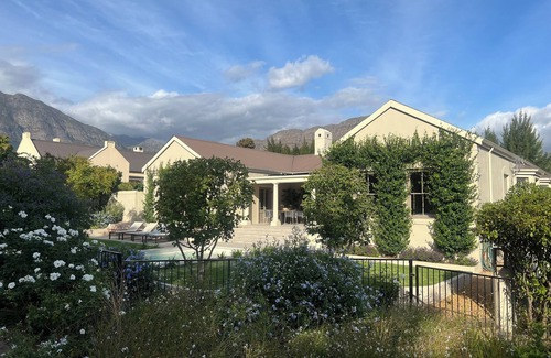 Franschhoek House | Stylish House + Pool situated amongst vine's & olive trees, exclusive domaine