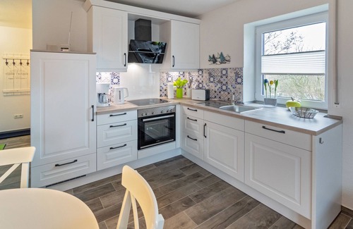 Westeraccumersiel Apartment | Stylish new-build top floor apartment with air conditioning and far-reaching views