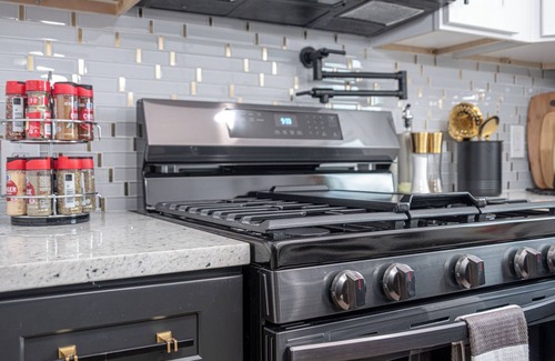Eastside Promise Neighborhood House | Stylish Stay with Unforgettable Downtown Views!