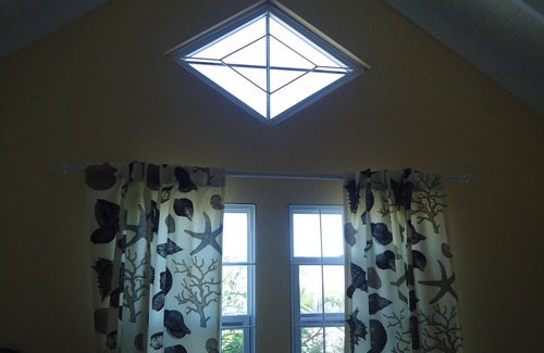Bottom Bay Apartment | Stylish villa apt, world famous Bottom Bay 5 min walk,swimming pool.A/C