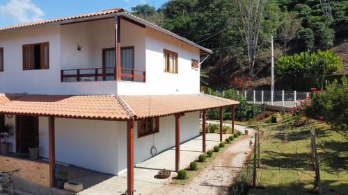 Espera Feliz House | Suítes no Paraíso