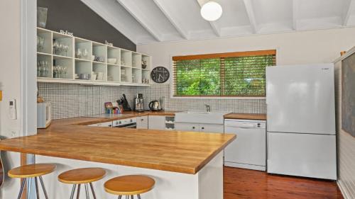 Copacabana House | Sublime Beach Getaway, Spacious Balcony with BBQ
