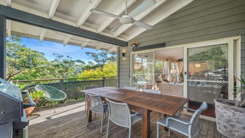 Copacabana House | Sublime Beach Getaway, Spacious Balcony with BBQ