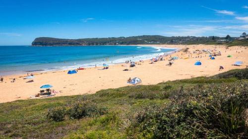 Copacabana House | Sublime Beach Getaway, Spacious Balcony with BBQ