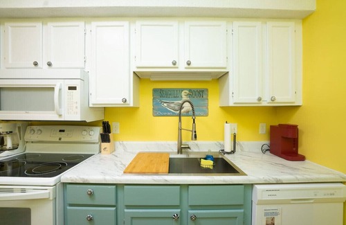 Carolina Beach Condo | "Suite Caroline” By the Beach & a Poo? Oh yes yes!