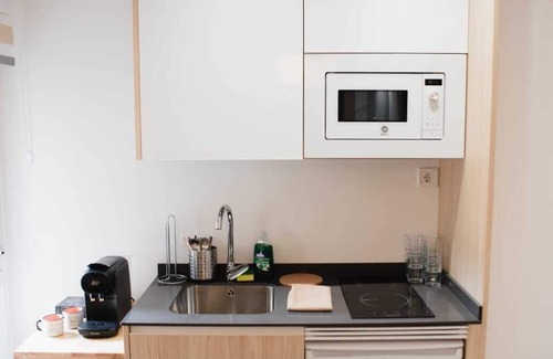 Vista Alegre Apartment | Suite room with double bed, sofa bed, double bed a