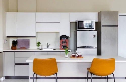 New Kingston Condo | Suite Tangerine Classy & Conveniently Located