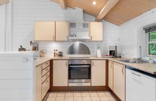 Faxe Ladeplads House | summer cottage with jacuzzi and sauna