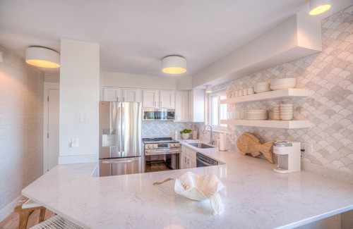 North Carolina Coast Condo | Sun drenched panoramic ocean views 3 king suites