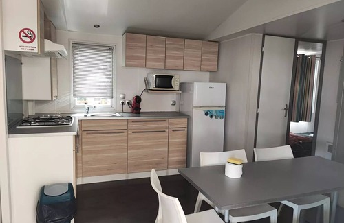 Saint-Cyprien House | Sun & Sea - Camping Le Bosc * - C301 MH 34 m2 3 bedroom, air conditioning , terrace of 18 m2 very good location in the campsite 7 people