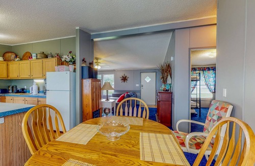 Alvin House | Sunny Acreage - Prime Location Home with Beautiful Yard & Recent Renovations