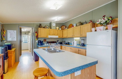 Alvin House | Sunny Acreage - Prime Location Home with Beautiful Yard & Recent Renovations