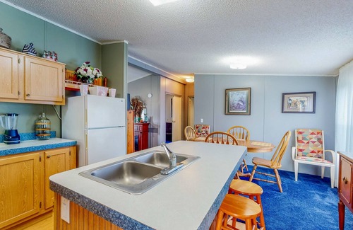 Alvin House | Sunny Acreage - Prime Location Home with Beautiful Yard & Recent Renovations