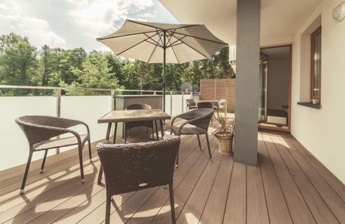 Elk House | Sunny apartment with terrace right in the woods