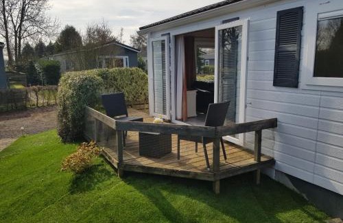 Berkhout Ski Chalet | Sunny Chalet near Amsterdam at Camping Venhop