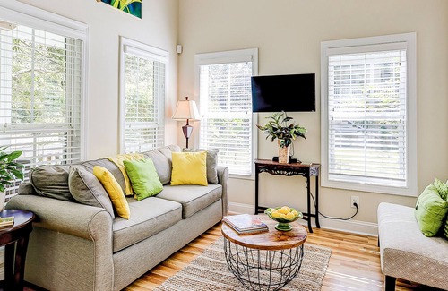 Scanlonville Cottage | Sunny garden cottage with a furnished front porch, grill, AC, & washer/dryer