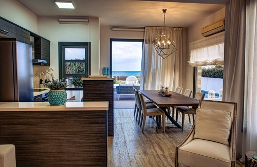 Mazotos Villa | Sunny Serenity by the Sea: A Mediterranean Escape with Private Beachfront Villas