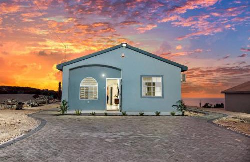 Discovery Bay House | Sunset at ArecaHomes Beach Access Pool and Water Park
