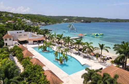 Discovery Bay House | Sunset at ArecaHomes Beach Access Pool and Water Park