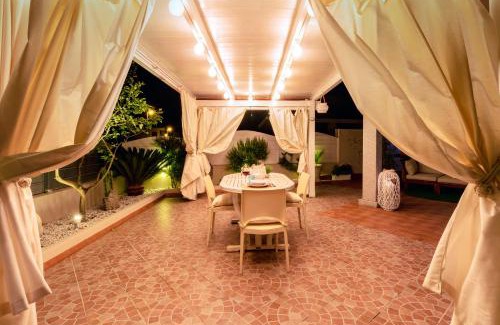 Valledoria Villa | SUNSET BAY POOL VILLA SARDINIA with private heated pool, jacuzzi, counter-current swimming