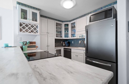 Villa Sabine Condo | Sunset Bay Views! 3BR Condo with Pool, Dock and Beach Access