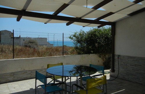 Scoglitti House | sunset over the bay holiday home