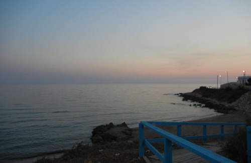 Scoglitti House | sunset over the bay holiday home