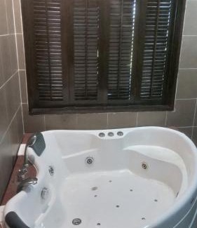 Endah Apartment | sunset studio apartment At Goldcoast morib