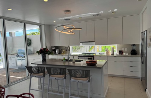 Leeward Settlement Villa | SunsetOne Beach Villa - Golf Cart 6 seats, Kayaks, SUPs; Free Beach Set Up