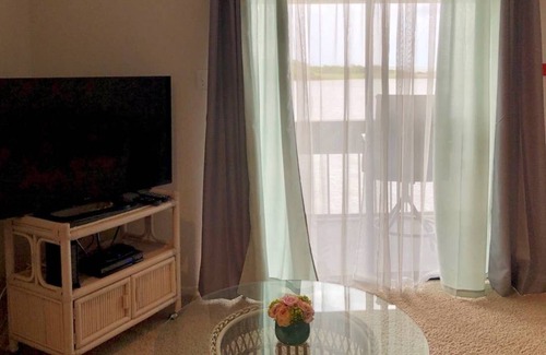 Port Arthur Condo | Sunshine Vibes Waterfront Condo Sabine Lake w Pool