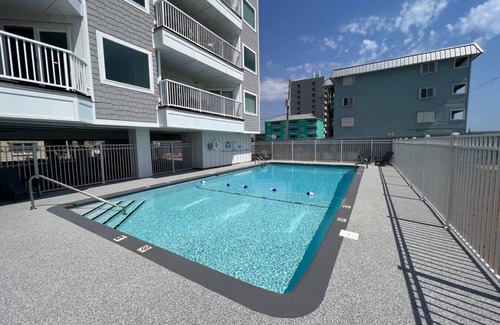 Carolina Beach Apartment | Surf’Inn at Carolina beach Boardwalk with Pool!