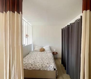 Centre Ville Apartment | T1 de standing à Port Boinot avec balcon