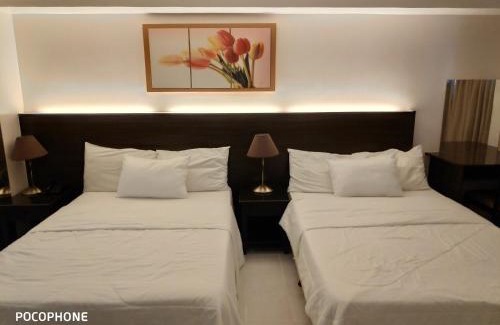 San Jose Apartment | Tagaytay Staycation by Naya and Darla w Free Swimming Pool, WiFi & Netflix