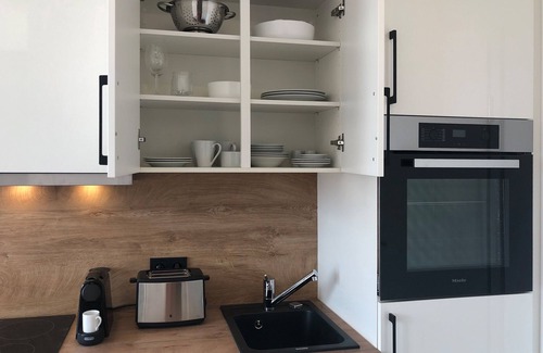 Schweinfurt Apartment | Temporary living in the heart of Schweinfurt furnished 1-room apartment with elevator