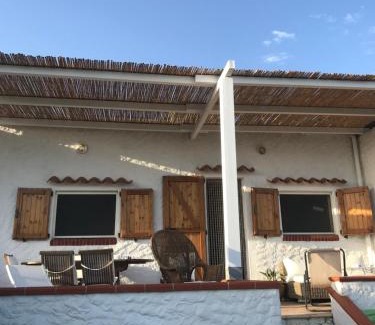 Sant'Antioco House | Terrace with dreamy sunset Cala Sapone