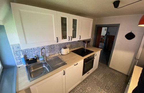 Damlos House | Thatched roof at the edge of the field with a magnificent view