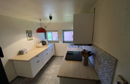 Damlos House | Thatched roof at the edge of the field with a magnificent view