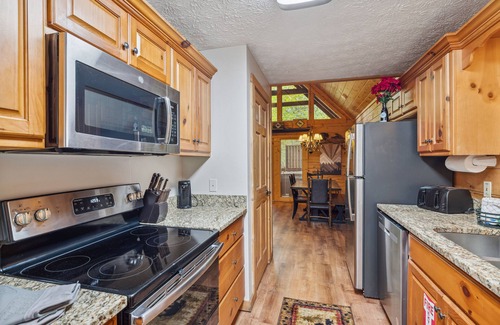 Gatlinburg Cabin | The Adventure Lodge Located in Black Bear Falls Resort with 3 King Suites!