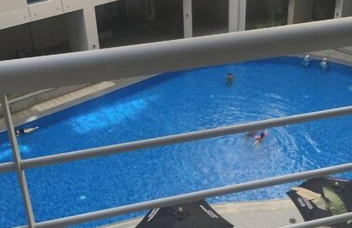 Al-Basatin Apartment | the apartment is having a nice swimming pool in a quit area .
