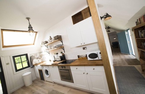 Ardroil Cottage | THE BARN AT REEF, pet friendly, with open fire in Timsgearraidh
