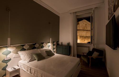 Rione XI Sant'Angelo Apartment | The Best Rent - Three-Room Apartment with View of the Portico d'Ottavia