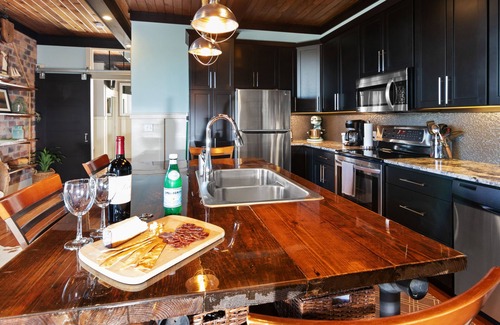 South Haven Condo | The Black Pearl: industrial condo sleeps 6, full size kitchen & scenic views!
