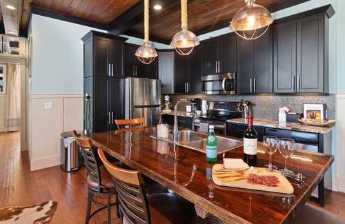 South Haven Condo | The Black Pearl: industrial condo sleeps 6, full size kitchen & scenic views!