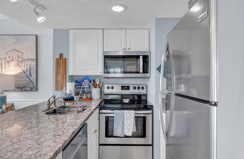 Fort Morgan Condo | The Blue Squid 2-bedroom condo in charming Gulf Shores with fitness room, AC