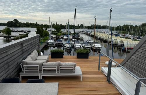 Municipality of Aalsmeer House | The Boathouse with boat