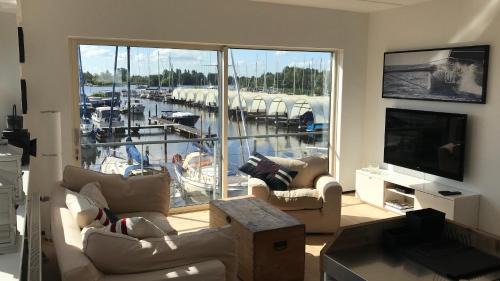 Municipality of Aalsmeer House | The Boathouse with boat