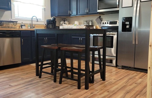 Decatur Cabin | The Bunkhouse at Woodland Escape. Paradise meets countryside with pool & hot tub
