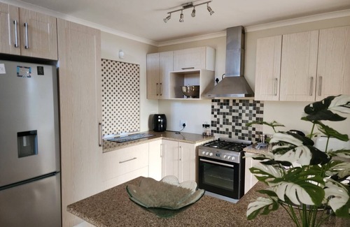 Port Owen House | The Grace @ Pelican Bay is a delightful canal-side retreat located in Port Owen.