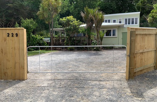 Omapere House | The Green Bach opposite beach- quirky and great for groups and families