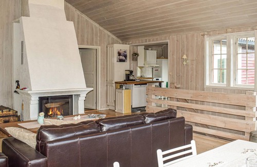 Horten House | The hidden house in the forest- built on rocks, with large terrace and view of the lake.